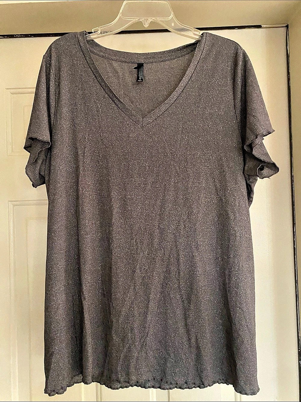 Torrid’s Sparkle Knit Gray V-Neck Tunic